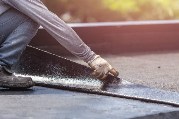 Professional Emergency Waterproofing technician working in Bohemia, NY